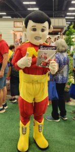 M Hero holding motorcycle safety activity book.